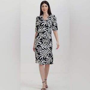 Dresses | Black Button Front Fitted Puff Sleeve Skater Dress | Poshmark
